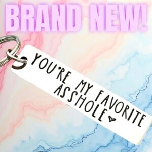 Silver Keychain with Black Naughty Text